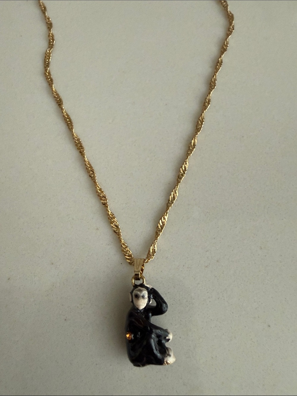 Gold Chain Necklace with Black Monkey Pendant